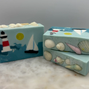 Light House with Sailboat Soap topped with soap seashells