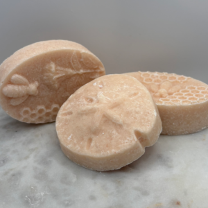 Himalayan Salt Bar Image of Bee Ovals (larger bars) & Sand Dollar (smaller bars.)